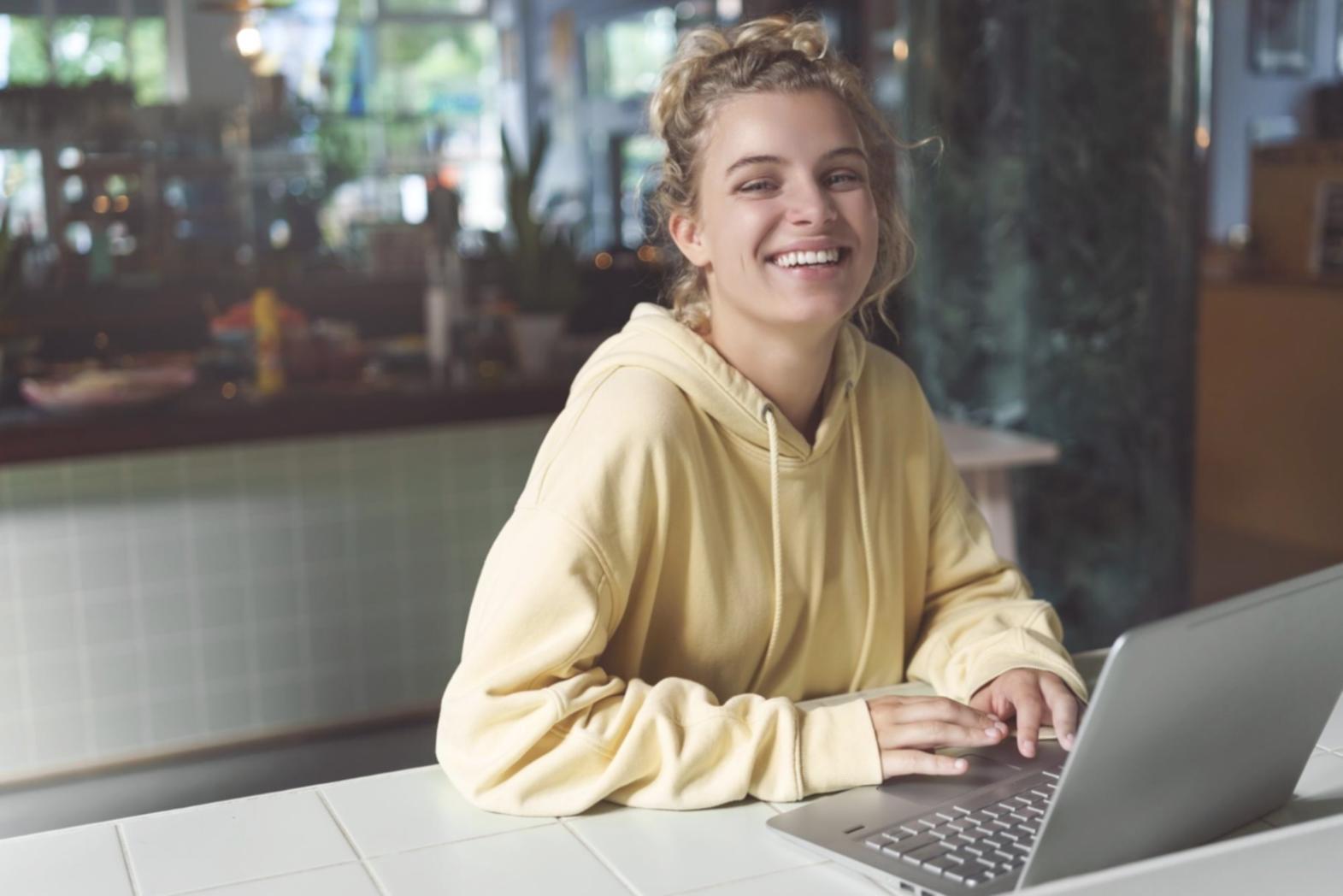 Team collaboration session with blockchain architecture diagrams on whiteboards